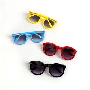 Retro round frame kids sunglasses with UV400 protection and silver metal accents