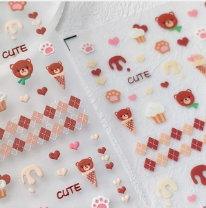 Detail of 5D cute brown bear and cupcake embossed nail stickers with 3D relief texture