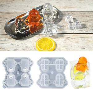 Detail of penguin-shaped silicone ice mold with 4 cavities for whiskey ice cubes