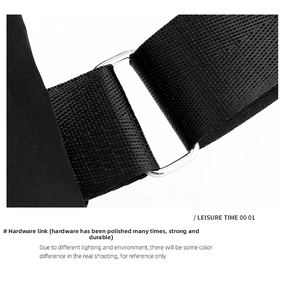Close-up of polished silver hardware and durable black nylon strap on chest bag
