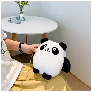Detailed view of plush panda crossbody bag with golden chain strap for kids fashion
