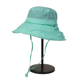 Mint green quick-dry sun hat for women with wide brim and chin strap on black stand