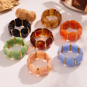 Bracelet élastique en résine avec perles dorées en acier inox en plusieurs couleurs