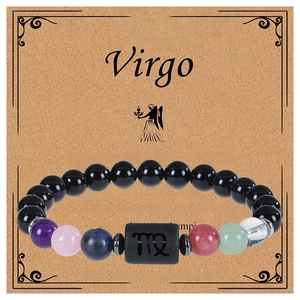 Detailed macro shot of Virgo zodiac handmade beaded bracelet on kraft paper gift card