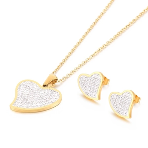 Golden heart-shaped jewelry set with necklace and earrings encrusted with crystals