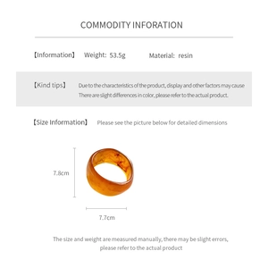 Detailed size chart for resin amber bangle measuring 7.8cm by 7.7cm and weighing 53.5g