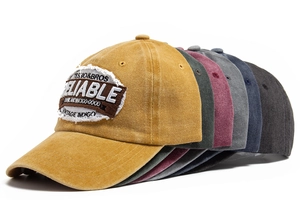 Detail showing vintage washed cotton baseball caps in six colors with reliable embroidery