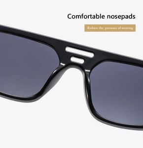 Detail of comfortable nose pads and double bridge design on black punk sunglasses