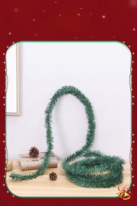 Close-up of deep green 5.5m flexible PVC Christmas garland with realistic pine needle texture
