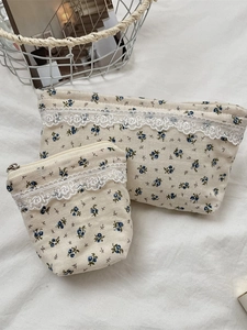 Floral print cosmetic bag set with blue berry patterns and lace trim detail