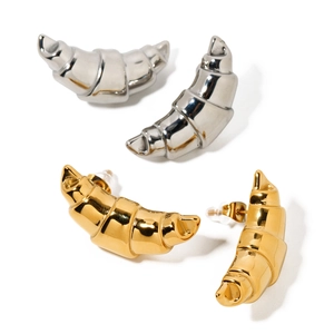 Polished 18k gold and silver stainless steel chunky croissant hoop earrings on white background