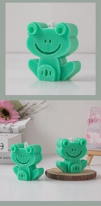 Detailed view of a green dinosaur animal scented candle for creative home decoration