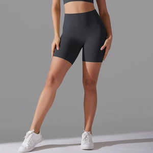 Side view of dark grey high waisted seamless yoga shorts with compression waistband