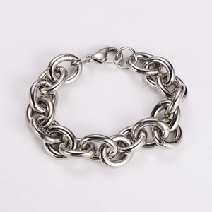 Close-up of a silver stainless steel cable chain bracelet with a durable lobster clasp