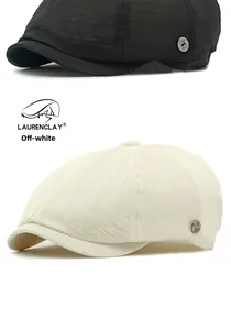 Close-up of newsboy cap with breathable mesh texture and branded metal side button
