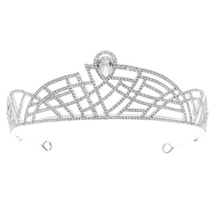 Macro detail of silver baroque crown with pear-cut rhinestone and geometric mesh design