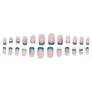 French blue star press-on nails set with rhinestones and yellow accents on white background