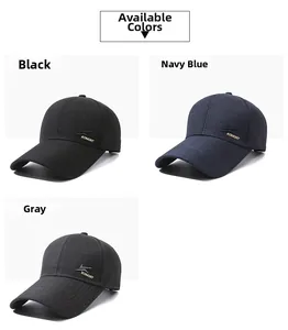 Detailed view of baseball caps in black, navy blue and grey with side embroidery