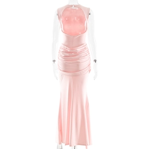 Detailed close-up of pink backless dress showing side waist gathering and elastic fabric