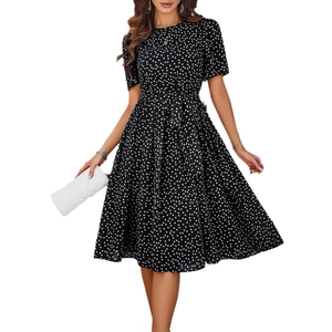 Robe mi-longue évasée style vintage à pois noirs et blancs avec ceinture à nouer