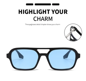 Close-up of durable metal hinge on black square sunglasses with blue lenses