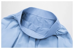 Detail view of the wide waistband and breathable mesh lining on light blue tennis skirt