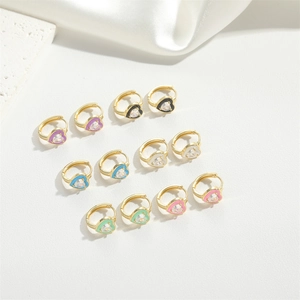 Detailed grid of colorful enamel heart earrings with centered zircons and gold plating