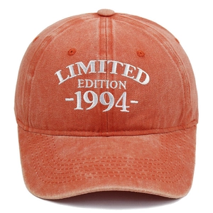 Detailed embroidery of LIMITED EDITION 1994 on a vintage washed brick red baseball cap
