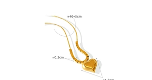 Macro view of gold heart pendant on snake chain with dimensions 1.8cm and 40+5cm