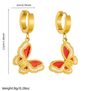 Gold-plated butterfly drop earrings with red and white enamel wings and size markers