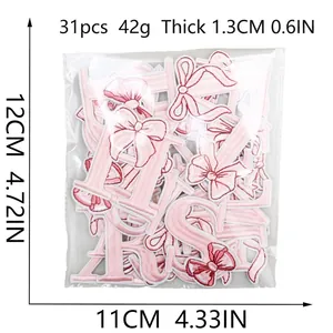 31-piece pink bow embroidered alphabet patch set packaged in a clear bag for DIY decor