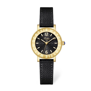 Detail of gold bezel with Scottie Watch engraving and blue gem crown on black dial