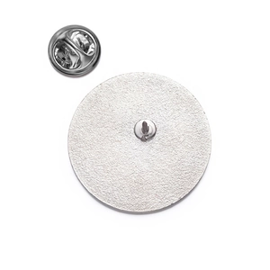 Detailed back view of a silver metal badge with butterfly clutch and secure tie tack pin