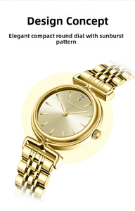 Detailed close-up of a gold ladies' watch with sunray dial and metal link bracelet