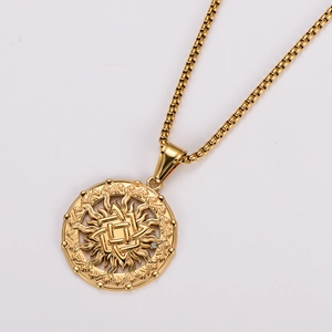 Detailed close-up of a gold-plated sun god pendant on a box chain with intricate patterns