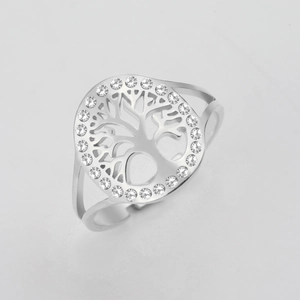 Detailed view of silver tree of life ring with sparkling zircon inlays and split band