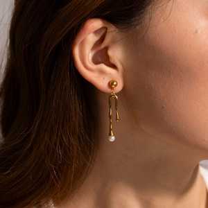 18k gold plated stainless steel fluid lava drop earrings with elegant pearl drop charm