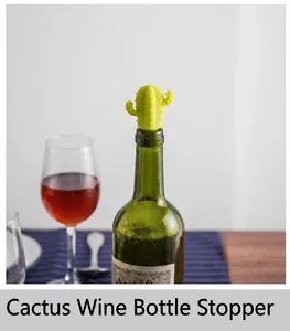 Close-up of green cactus-shaped silicone wine bottle stopper sealing a glass bottle