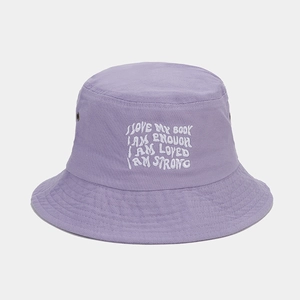 Detailed embroidery on lavender cotton bucket hat with metallic ventilation eyelets