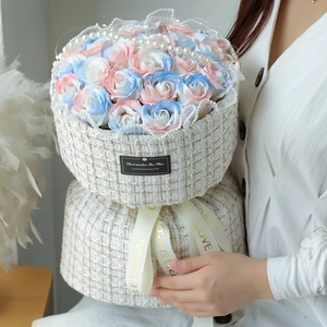 Pink and blue soap rose bouquet in a beige tweed gift box with elegant pearl chain decoration