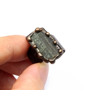 Detailed view of handmade vintage bronze ring featuring natural green druzy agate stone