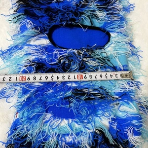 Blue camouflage knitted balaclava mask width measurement showing 20cm on measuring tape