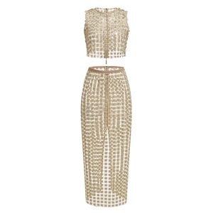 Detail of 3D floral lace embroidery and sheer mesh fabric on champagne evening set