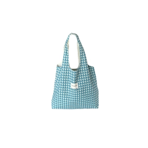 Sky blue and white plaid woven tote bag with top handles on a clean white background