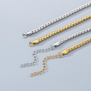 Détail du bracelet chaîne de blé réglable en acier inoxydable doré et argenté