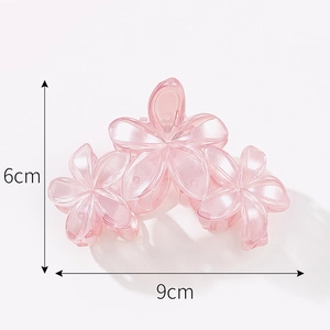 Pink 3D floral hair claw clip in translucent resin with 9cm width and 6cm height size guide