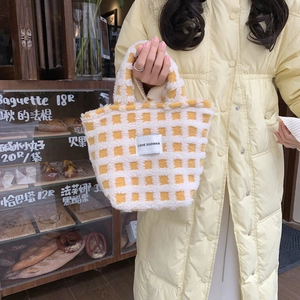 Detail of soft yellow and white checkered plush tote bag with LOVE SOZAKKA woven label