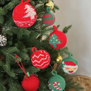 Knitted Christmas tree ornaments set with red and green patterns for holiday decor