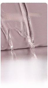 Detail of purple waterproof nylon fabric showing water droplets sliding off the backpack surface