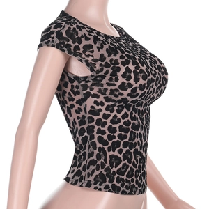 Detailed side view of fitted leopard print mesh top on a mannequin stand